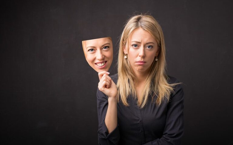 Faking Happiness When Depressed: Why You Do It and What You Need Instead